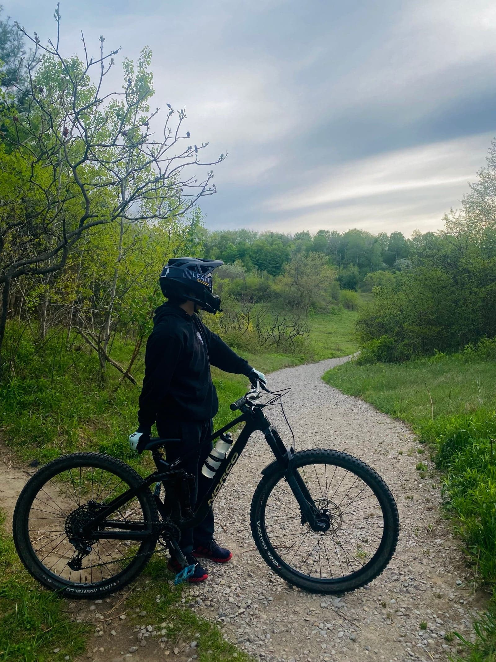 Eric Lu with his mountain bike on a GTA trail